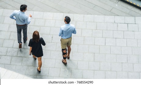 Top View Aerial Of Business People Walk In Pedestrian Street