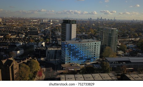 Top View Aerial Drone Image Of Suburbs In North London, England On A Bright Sunny Day.