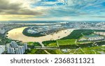 Top view aerial of a Ho Chi Minh City with development buildings, transportation, energy power infrastructure on a winter day. Cityscape on Saigon river in Ho Chi Minh City, Vietnam