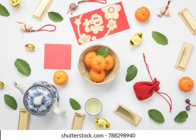 Top View Aerial Image Shot Of Arrangement Decoration Chinese New Year & Lunar New Year Holiday Background Concept.Flat Lay Fresh Orange With Food & Drink On Modern White Wooden At Home Office Desk.