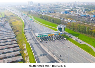 Top View Aerial Overloaded Toll Road Or Tollway On The Controlled Access Highway, Forced Traffic Jam