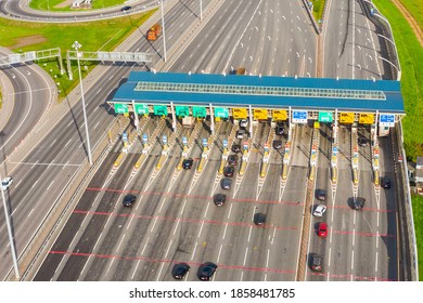 Top View Aerial Overloaded Toll Road Or Tollway On The Controlled Access Highway, Forced Traffic Jam