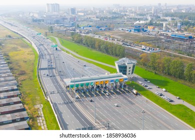 Top View Aerial Overloaded Toll Road Or Tollway On The Controlled Access Highway, Forced Traffic Jam