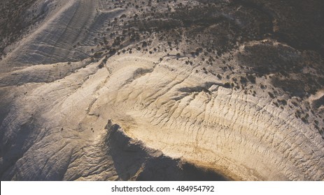 Top View Aerial Photo From Drone Of Canyon Range In Arid Wilderness Landscape. Flight Over American National Park With Rock Mountain In Desert Valley. Beautiful Nature Background For Travel Website