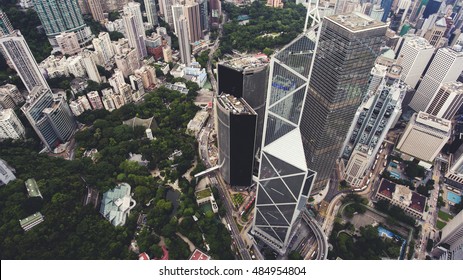 Top view aerial photo from drone of big metropolis city with development urban and transportation infrastructure. Office skyscrapers of HongKong world's leading international financial center