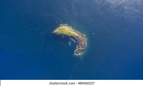 Top View Aerial Photo From Flying Drone Of A Little Green, Tropical Island In Open Sea In Thailand. Small Beach In Indian Ocean With Turquoise Water With Copy Space For Your Advertising