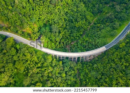 Top view Aerial photo from flying drone over The highest bridge pier Phor Khun Pha Muang Bridge (Huai Tong at Phetchaboon Thailand.Bridge over the jungle.Bridge over mountain and green forest