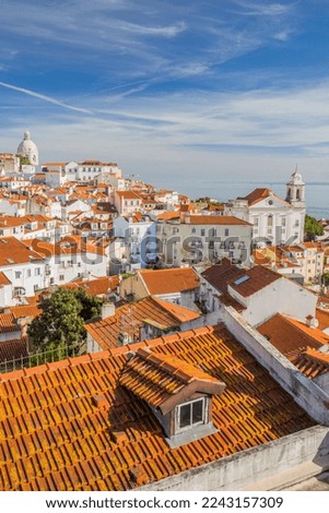 Top view. View of Alfama, the oldest district of the Old Town, with National Pantheon from belvedere Miradouro das Portas do Sol , Lisbon, the capital of Portugal.