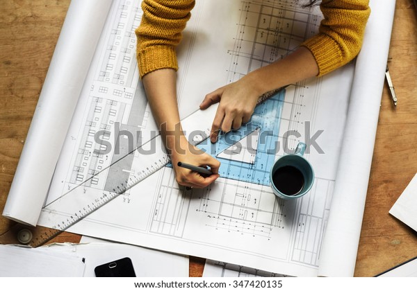Top\
view of architect drawing on architectural\
project