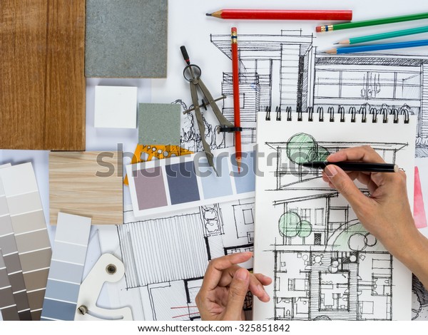 Top view of architect
& interior designer  working as home decoration and renovation
concept
