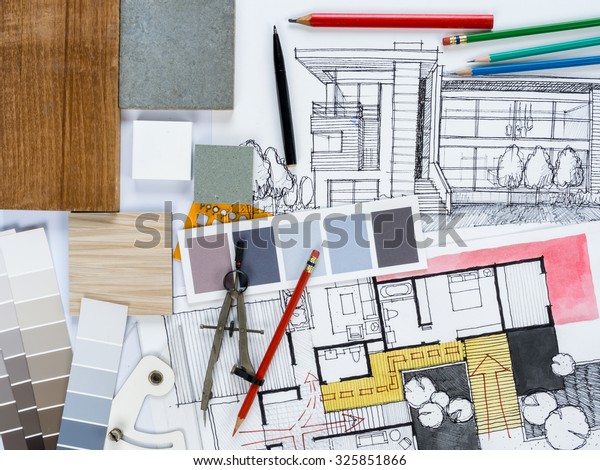 Top view of architect\
& interior designer  working as home decoration and renovation\
concept
