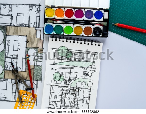 Top view of architect\
& interior designer  working as home decoration and renovation\
concept