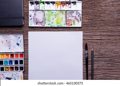 Top view of Art supplies on the wooden table - Powered by Shutterstock