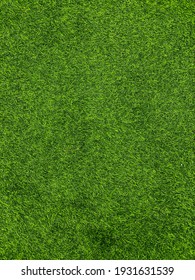 Top view of Artificial Grass. Green fake grass patter and texture