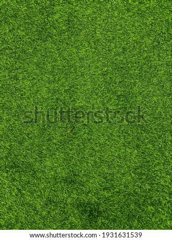 Top view of Artificial Grass. Green fake grass patter and texture