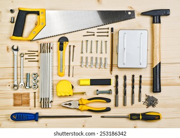 Top View of Assorted Woodwork and Carpentry or Construction Tools on Pine Wood Texture Background. - Powered by Shutterstock