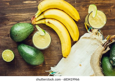 Top View Of Avocado Banana Smoothie With Ingredients.