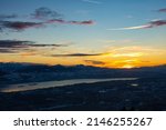 Top view from Bachtel Tower located at Zurich Oberland during Winter sunset time. Panorama view over lake of Zurich