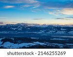 Top view from Bachtel Tower located at Zurich Oberland during Winter sunset time. Panorama view over lake of Zurich