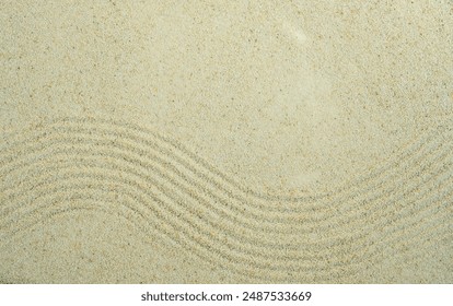 Top view of background and backdrop on sand The concept of balancing stones in a Japanese Zen garden
