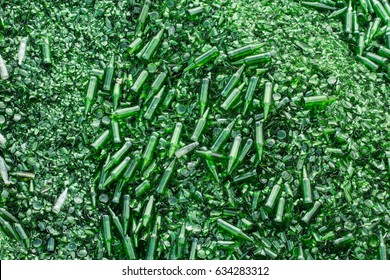 Top View Background Many Recycle Pieces Of Broken Glass In Green