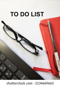 Top View Background Of Workplace With Notebook, Pen  Glasses And Lap Top  On  White  Background . Business Concept Mockup