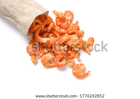 top view bag with big size dry shrimps on a white background