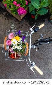 Top View Of The Basket Of A Bicycle In Summer With Garden Inside 