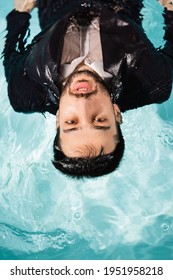 Top View Of Bearded Muslim Businessman Looking At Camera In Pool