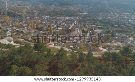 Top view of the beautiful town in early autumn. Shot. Urban landscape