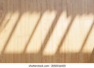 Top View Of A Beautiful Wooden Oek Wood Floor With Morning Sunlight And Shadow. Abstract, Brown, Warm, Background, Backdrop, Mock Up, Eco Living, Texture, Surface, Natural.