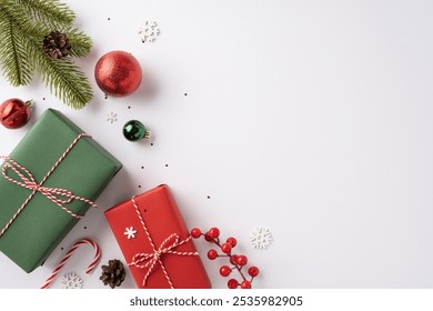 Top view of beautifully wrapped Christmas gifts with red and green ornaments, fir branches, and festive decorations on a light background - Powered by Shutterstock