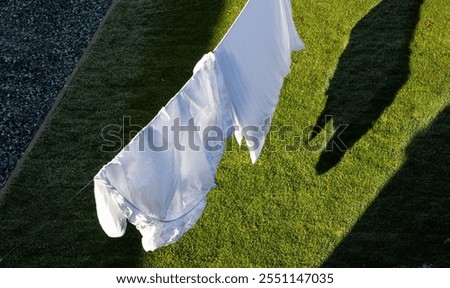 top view of bedsheets drying outside