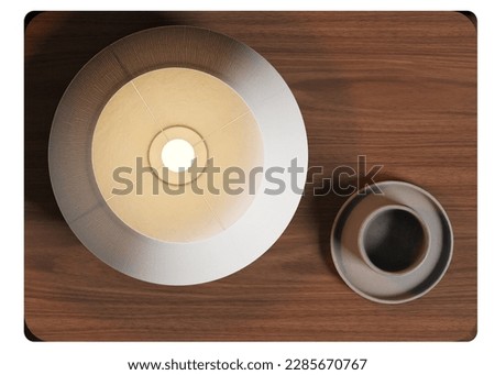 Top view of bedside table with lamp