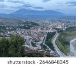 Top view from Berat city, a tourist destination in Albania, also known as the City of Thousand Windows, with its mountains in the background.
Berat, Albania - August 21st 2024.