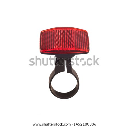 Top view of bike cataphote isolated on white background. Bicycle light retroreflector accessory