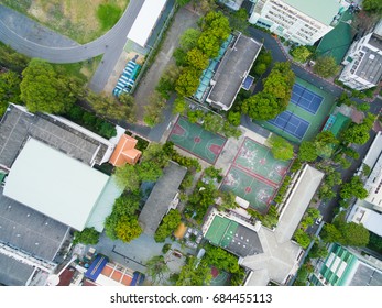 Top View, Bird Eye View Of School College With Basketball Court And Football Soccer Field.