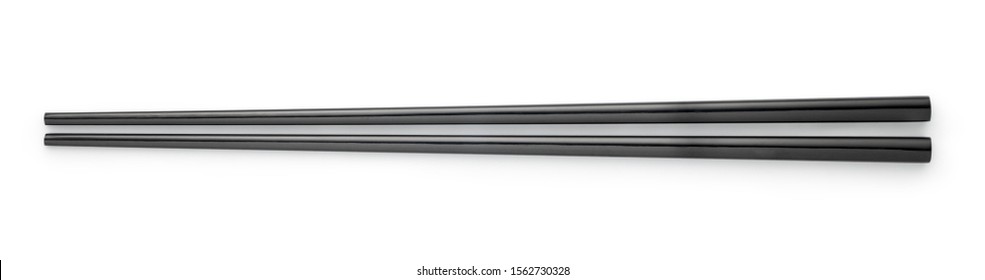 Top view of black chopsticks isolated on white background