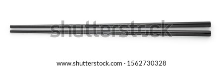 Top view of black chopsticks isolated on white background