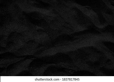 Top view Black sand texture background. Black Friday background concept.