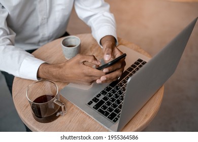 Top View Of A Black Young Man's Workplace. Smartphone And Laptop On The Terrace. Work Outside The Office, Remote Work Or Study Concept.