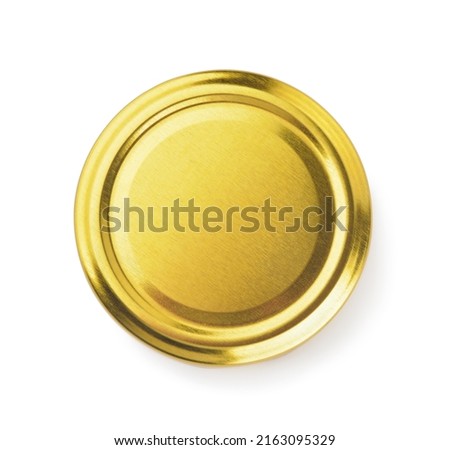 Top view of blank golden metal jar lid isolated on white