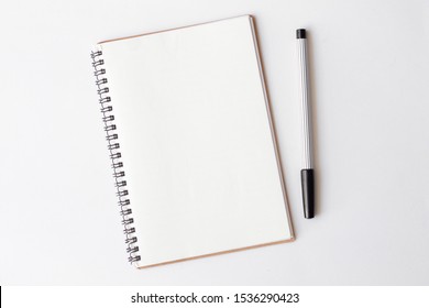 Top view of blank notebook with pencil on with background. Education concept.