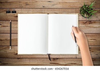 Top view of blank open notebook page on wood background office desk. Minimal flat lay style