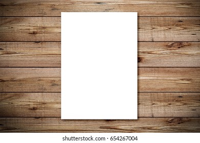 Top View Of Blank Paper Page On Wood Background Office Desk With Different Objects. Minimal Flat Lay Style