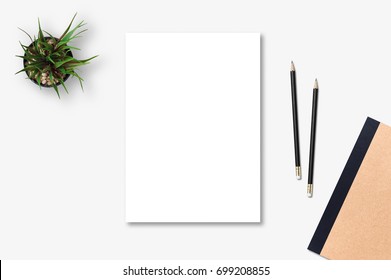 Top View Of Blank Paper Page On Wood Background Office Desk And Different Objects. Minimal Flat Lay Style