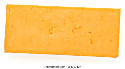 Top View Block Of Cheddar Cheese Over White