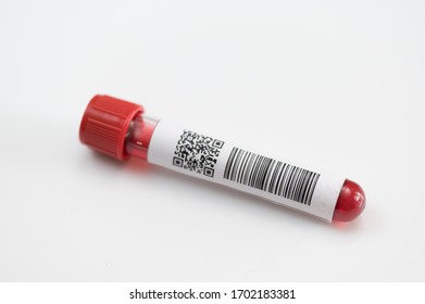 Top View Blood Test Tube Isolated And Barcode Label On White Background.Laboratory Medical Concept.