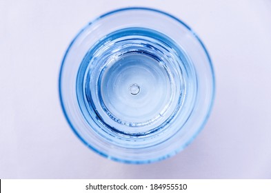 Top View Of A Blue Glass Of Water