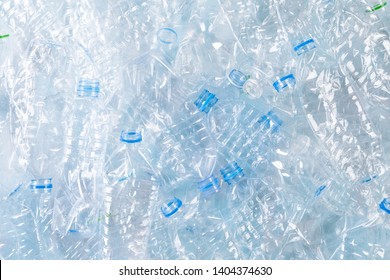 Top view of blue plastic bottles background. Recycle and World Environment Day concept